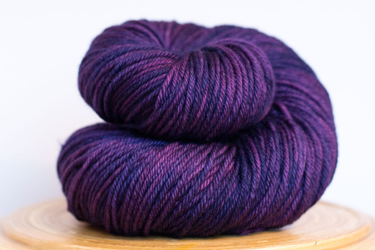 Andante hand-dyed worsted weight merino in Purple Rain