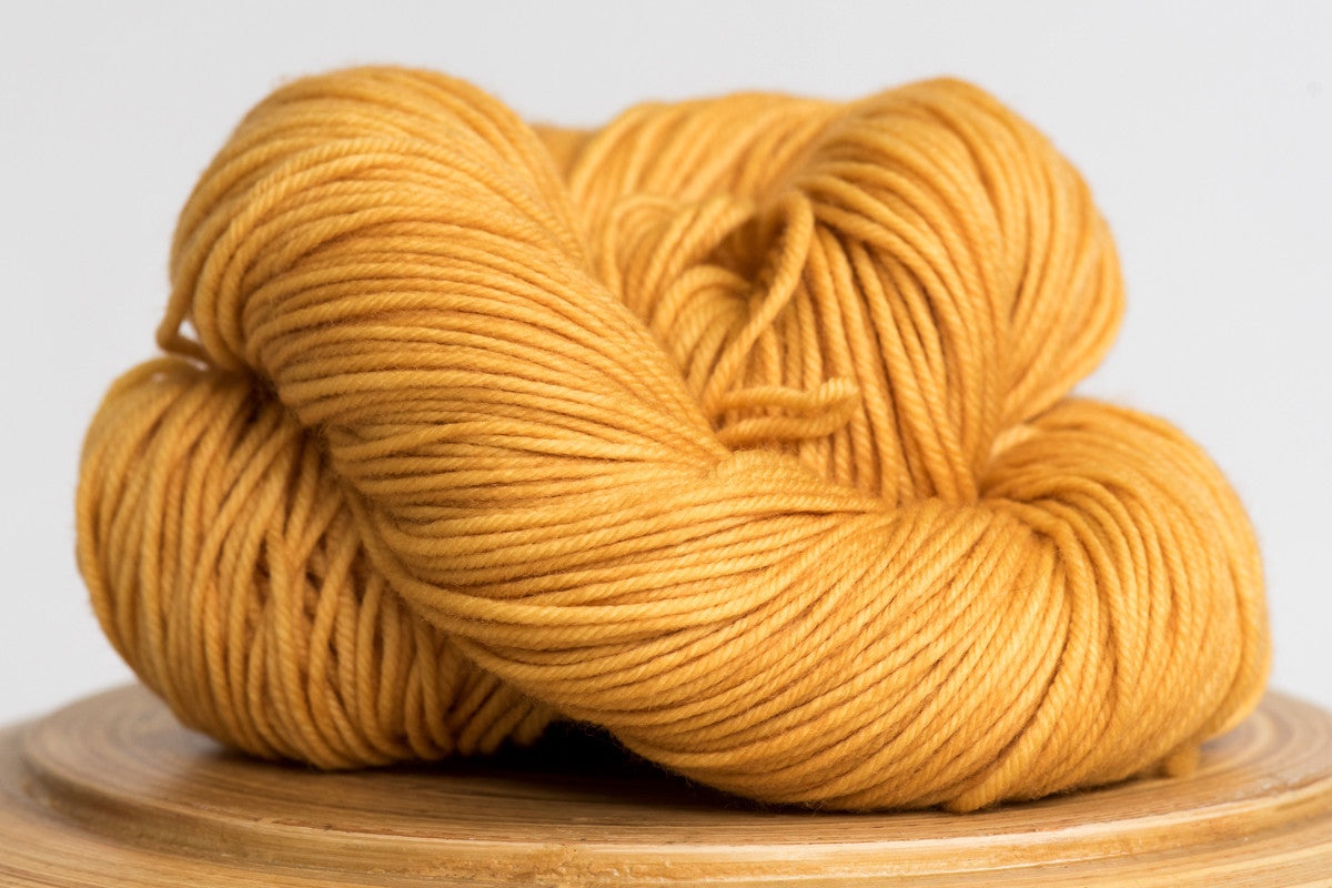 Mango bright yellow semi solid DK weight hand-dyed yarn