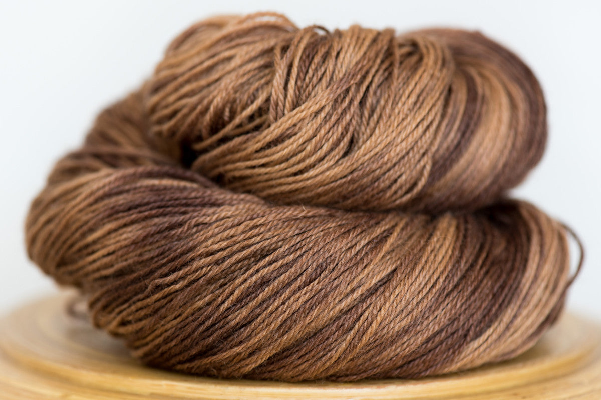 Pizzicato hand-dyed BFL sock yarn in Buckwheat