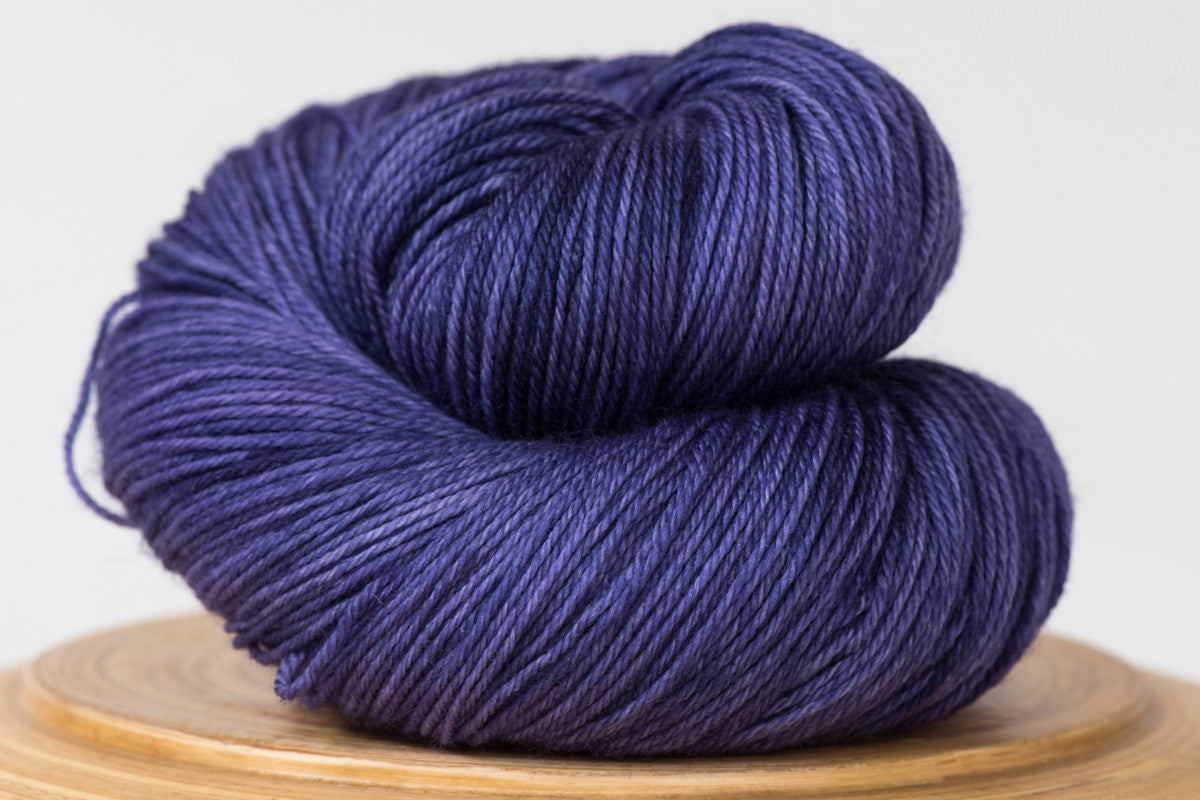 Deep purple semi solid fingering weight hand-dyed yarn
