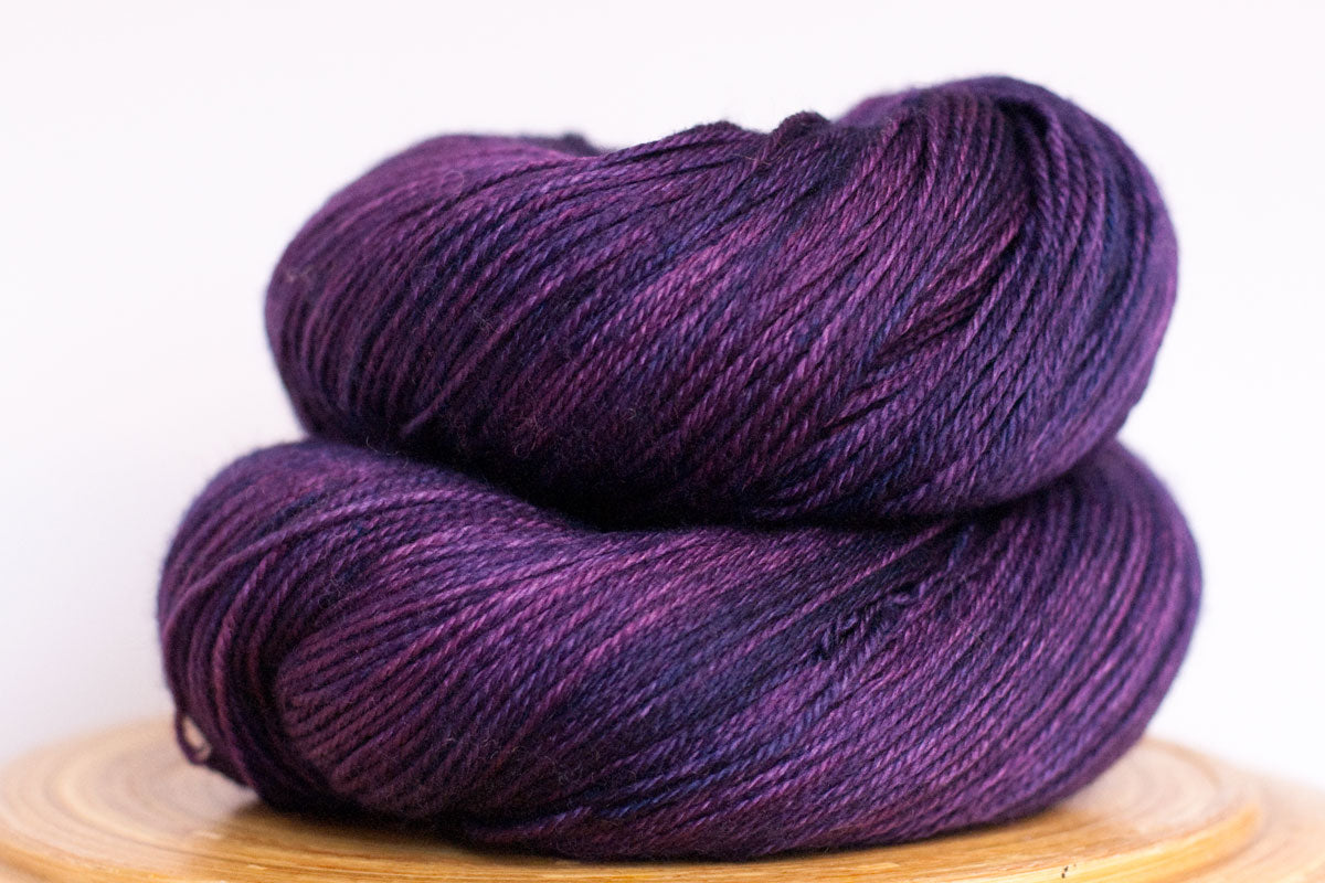 Purple rain semi-solid fingering weight hand-dyed yarn