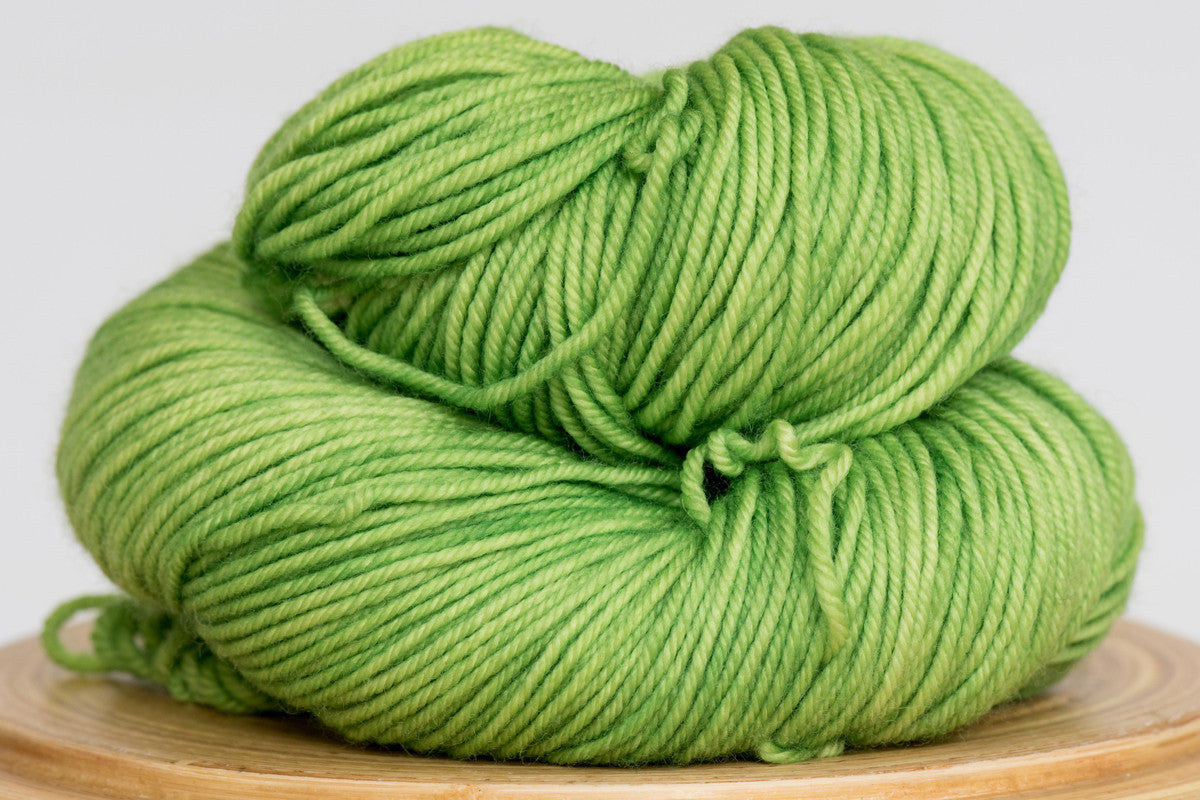 Grasshopper bright green semi solid DK weight hand-dyed yarn