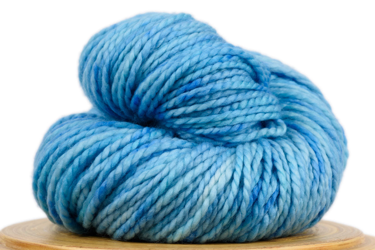 Presto bulky weight hand-dyed merino yarn in Calico Skies