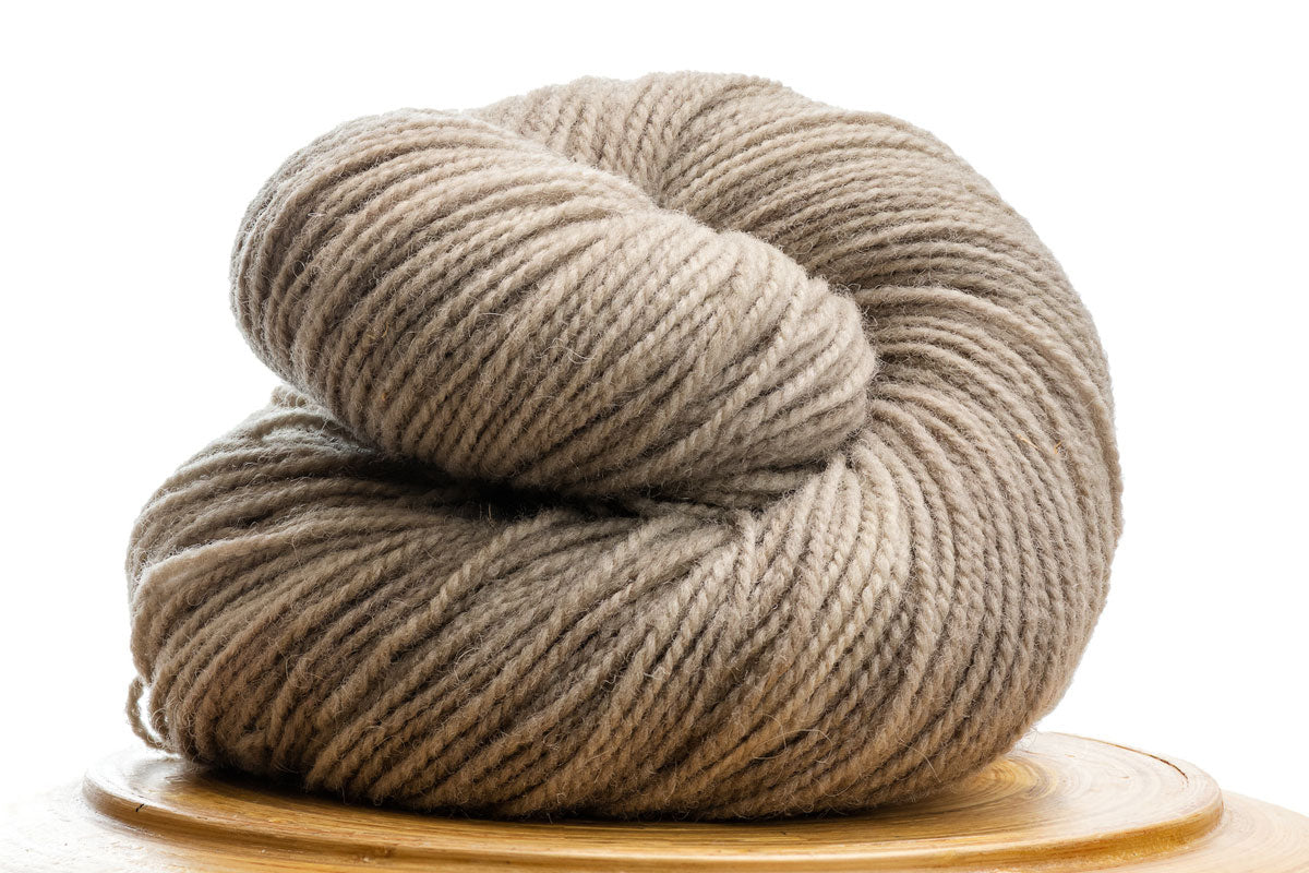 Winfield Canadian hand-dyed yarn in Shiitake, a pale warm neutral
